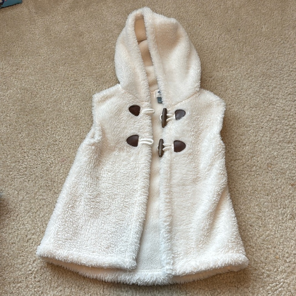 White fluffy vest